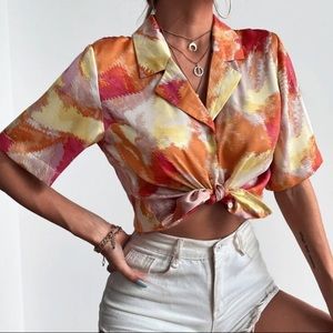 Yellow and orange shirt.